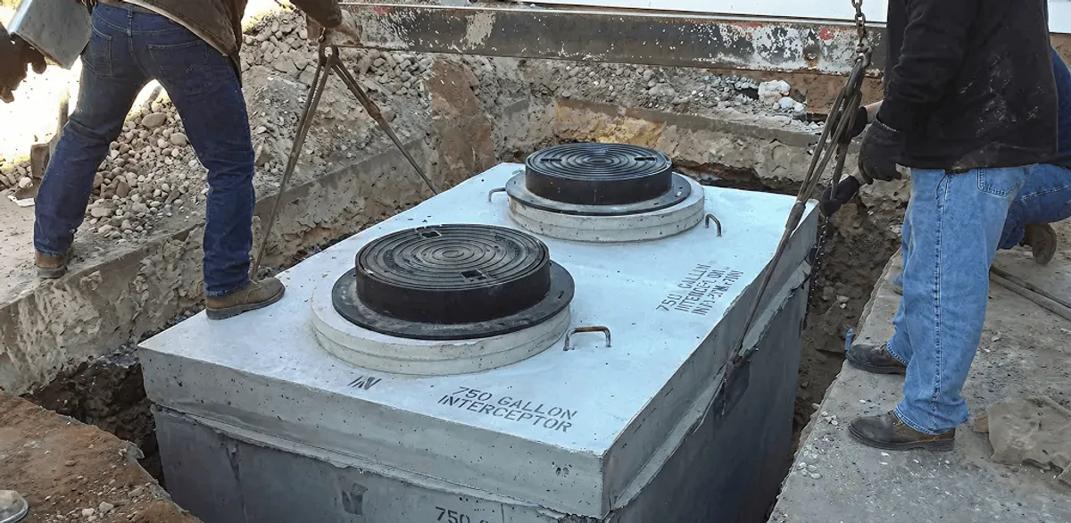 Grease trap installation for a commercial property drainage system in Orlando, FL