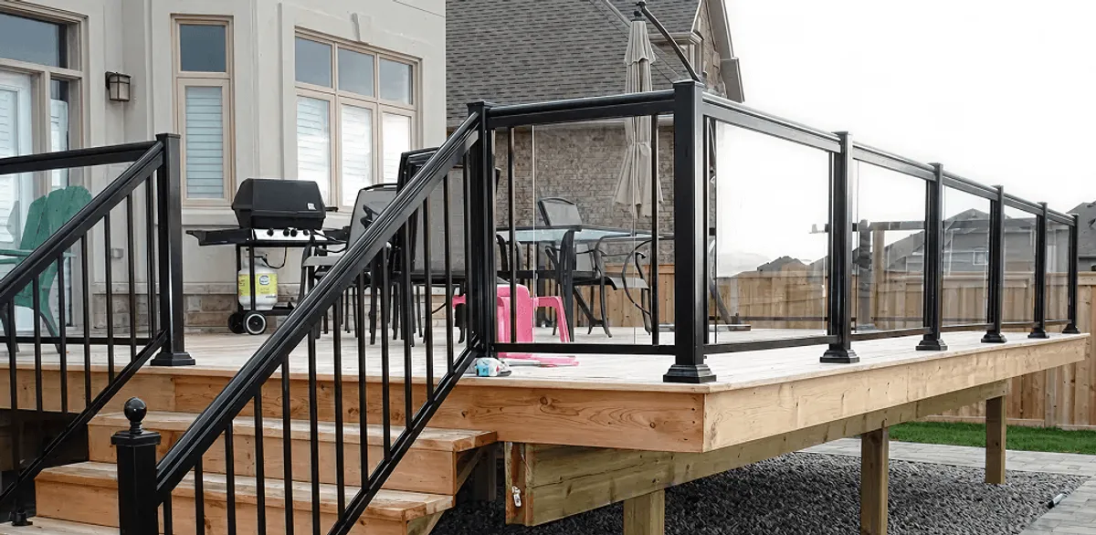 Handrail installation on a deck staircase for safety and code compliance in Orlando, FL