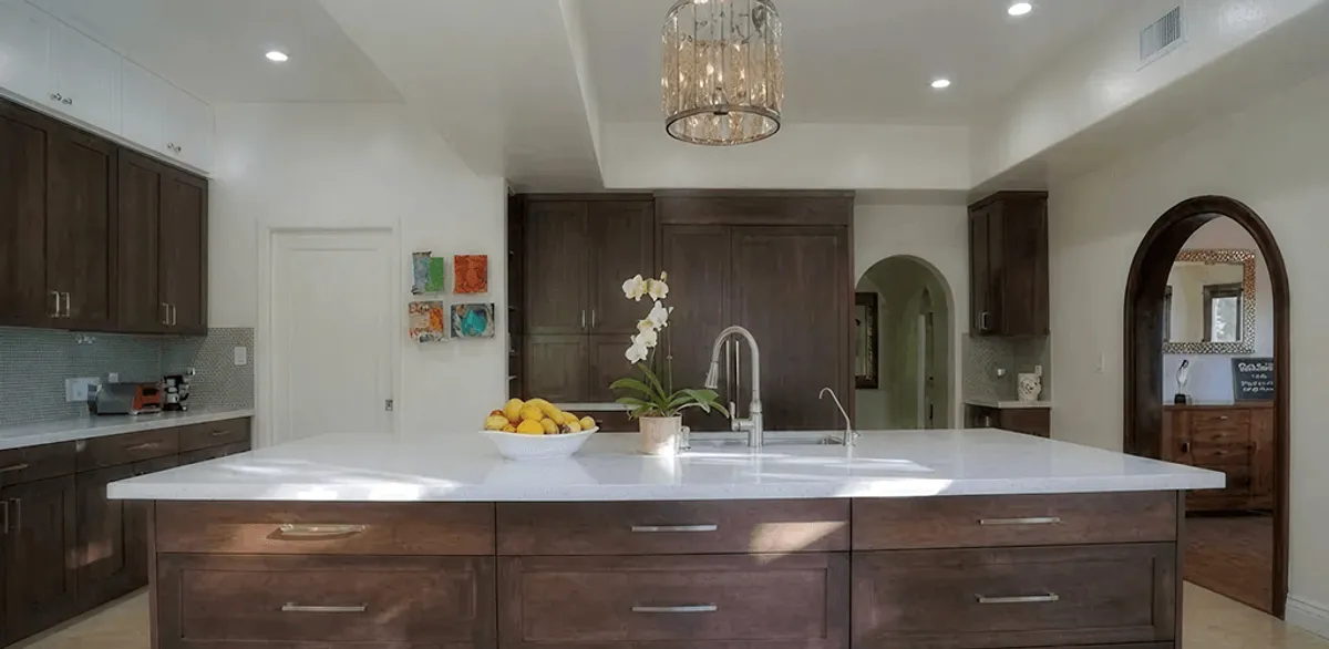 Cabinet refacing project with updated kitchen cabinets and island in Orlando, FL